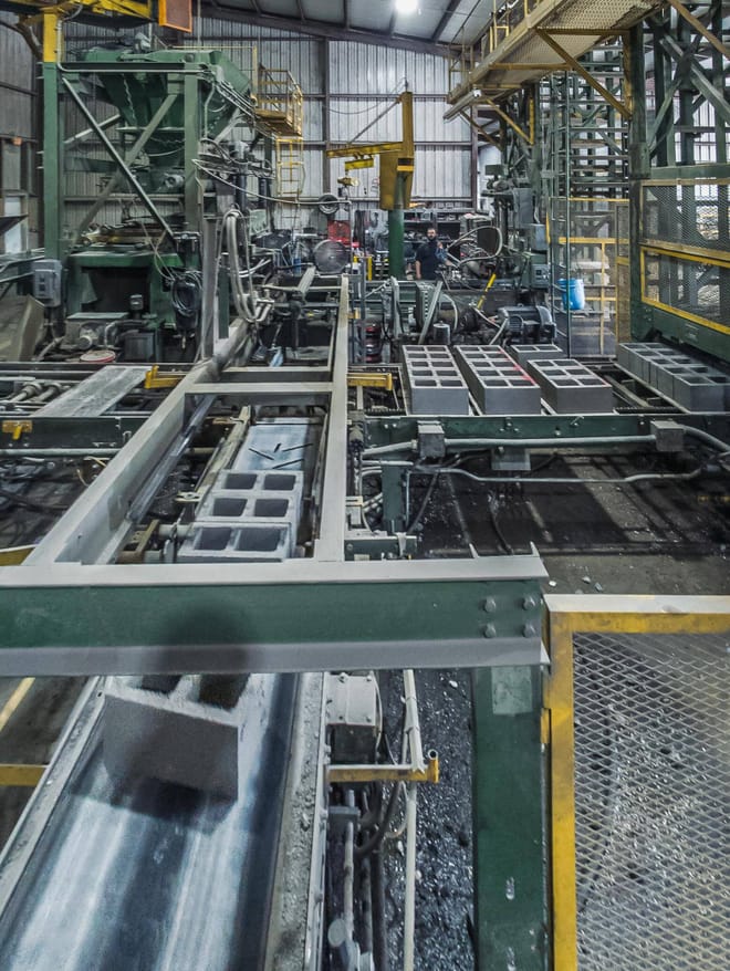 An industrial facility where concrete blocks are being made