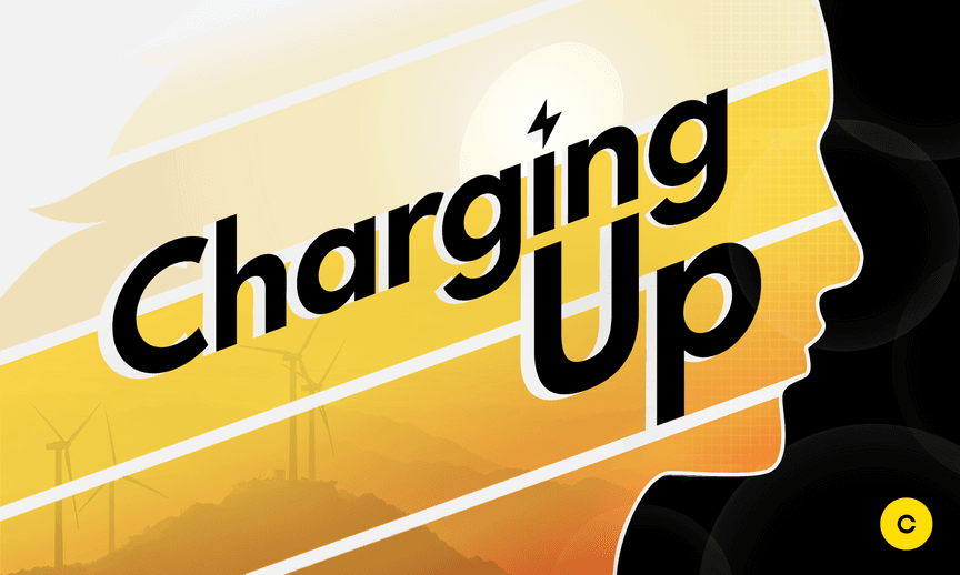 A human figure is shown in silhouette along with wind turbines and the words Charging Up