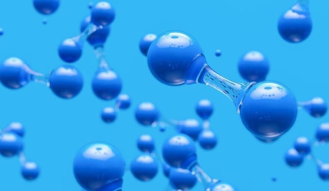 a conceptual image of hydrogen molecules against a blue background