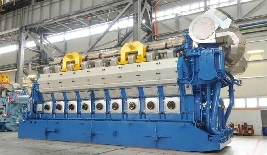 A large blue and yellow industrial engine