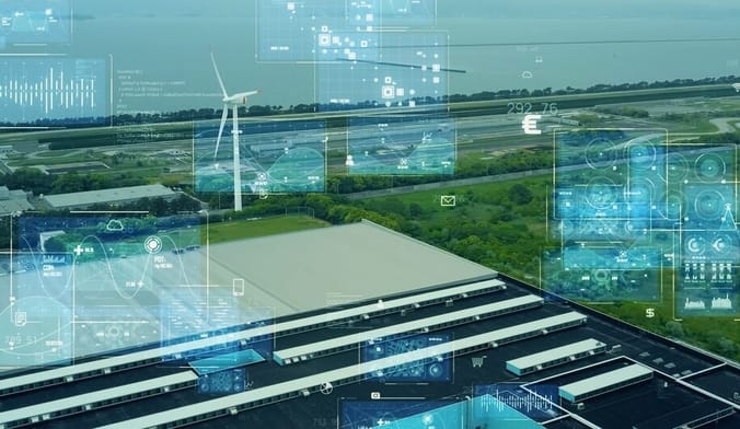 An image of a utility operation including a wind turbine overlaid with digital computer graphics