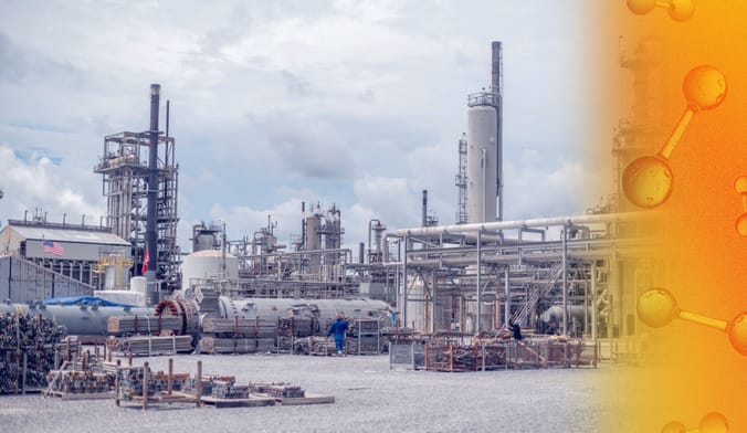An industrial facility with an overlay of orange hydrogen molecules