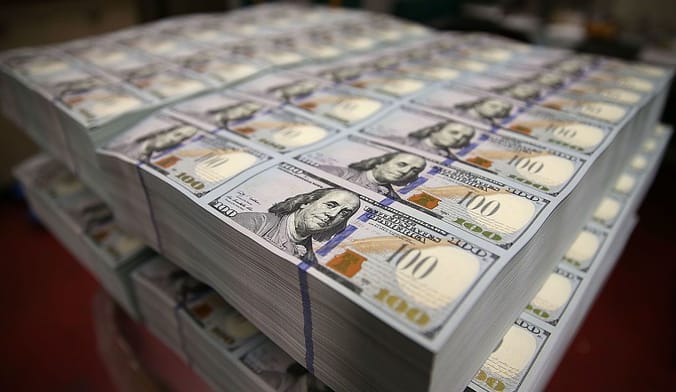 A large stack of US $100 bills