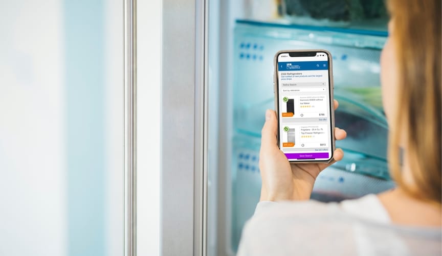 Woman looking at the Enervee app on smartphone