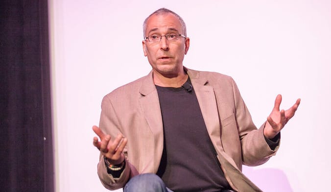 dude on stage in sportcoat