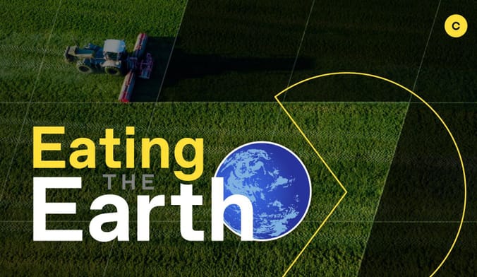 In the background, a tractor drives over a field. In the foreground, a Pac-Man-like character is about to swallow the Earth.