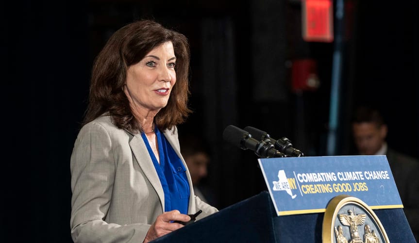 New York Governor Kathy Hochul speaks at a podium