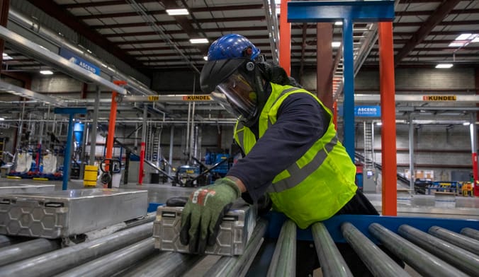 person at work in factory
