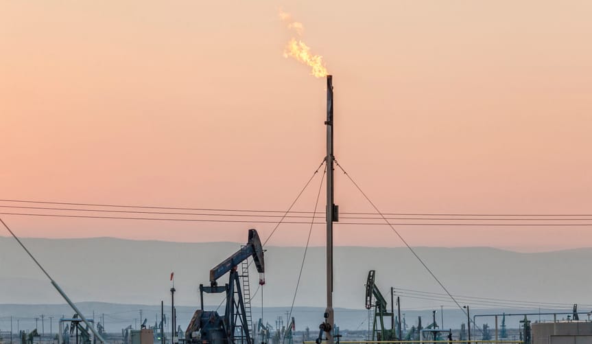 Flares burning off gas at Belridge Oil Field and hydraulic fracking site which is the fourth largest oil field in California