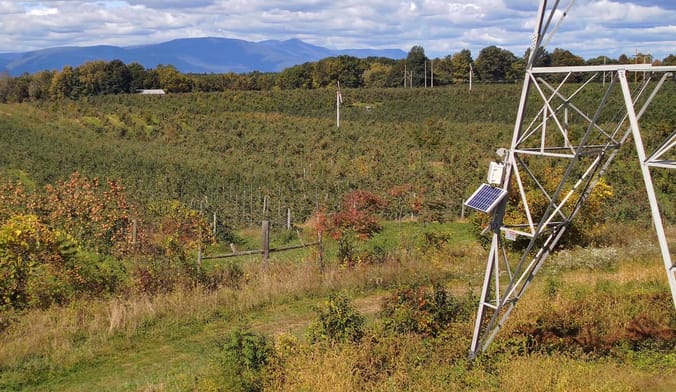A LineVision sensor at the base of a National Grid transmission tower.