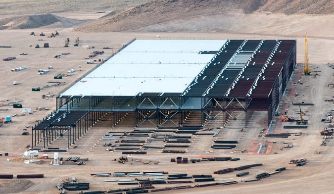 A very large industrial facility under construction in the desert