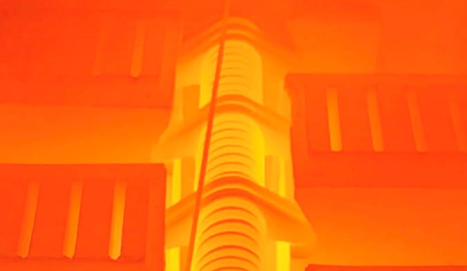 A thermal battery made by Rondo Energy undergoing testing at 1000 degrees Celsius.