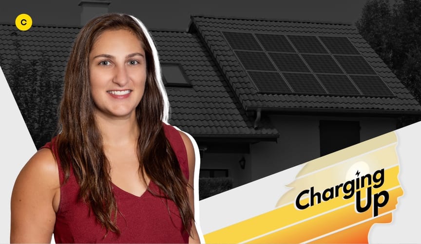 A smiling woman with medium skin tone and long brown hair wearing a sleeveless maroon shirt. Graphic reads "Charging Up."