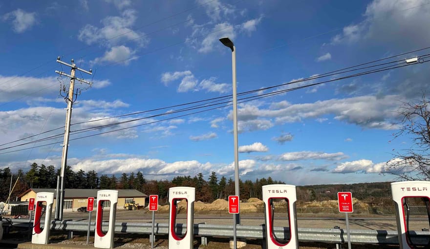 A row of Tesla chargers