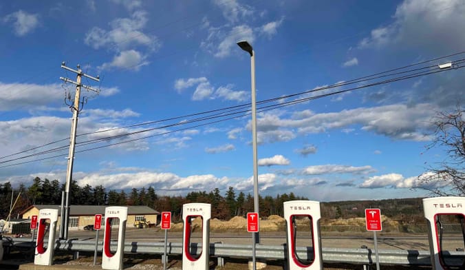 A row of Tesla chargers