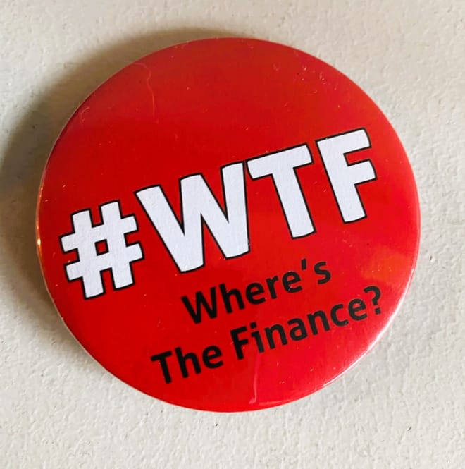 A red button with the words hashtag WTF — where's the finance?